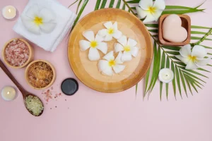spa-concept-beauty-fashion-concept-with-spa-set-perfumed-flowers-water-relaxation-zen-spa-setting-flat-lay-with-bowl-bath-salt-flowers-towel-natural-soap-top-view_1150-44577